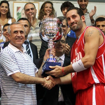 President Sleiman with the winning captain
