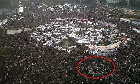 Egypt demonstrations in tahrir square with very little people praying..